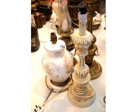 Four mixed table lamps including a gilt wood example. This lot is not available for in-house P&P.Condition Report: All electr