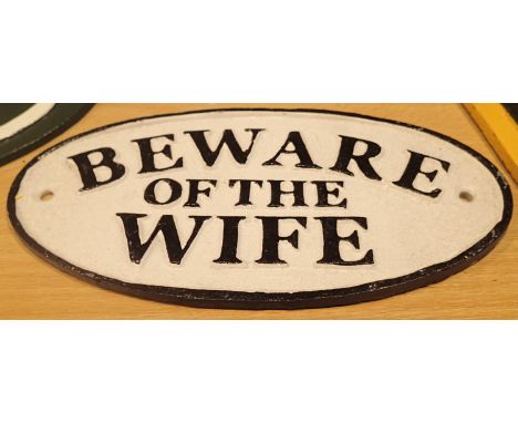 Cast iron Beware of the Wife sign, L: 17 cm. P&amp;P Group 2 (£18+VAT for the first lot and £2+VAT for subsequent lots) 