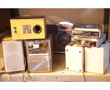 Three HiFi systems, Panasonic, Goodmans and Hitachi. This lot is not available for in-house P&P.Condition Report: All electri