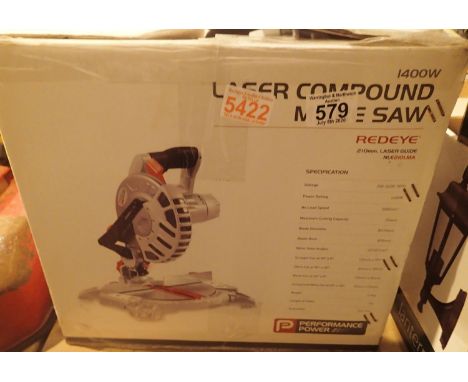 Boxed performance power laser compound mitre saw. This lot is not available for in-house P&P.Condition Report: All electrical