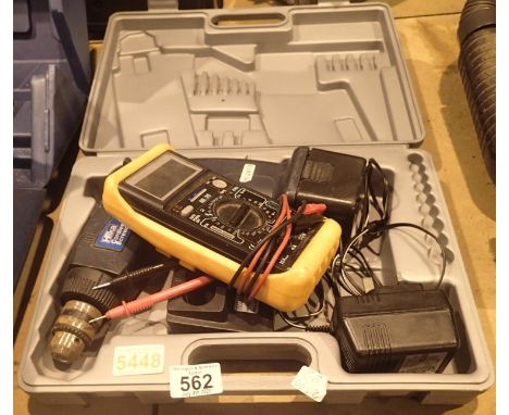 Hilka cordless battery drill with charger and Skytronic test meter. This lot is not available for in-house P&P.Condition Repo