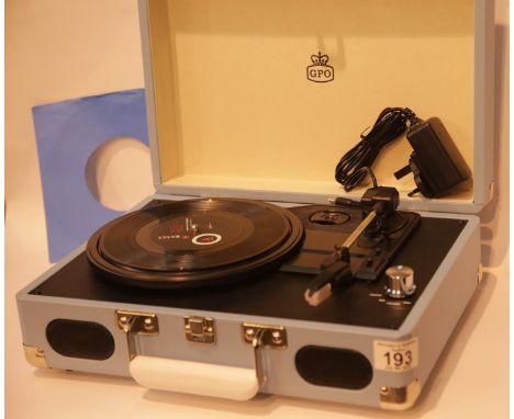 Blue GPO Soho 3 speed portable briefcase style record player; built in stereo speakers; auto stop (LPs only); output: RCA con
