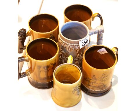 Six collectable ceramic tankards, some with Game related decoration. This lot is not available for in-house P&amp;P. 