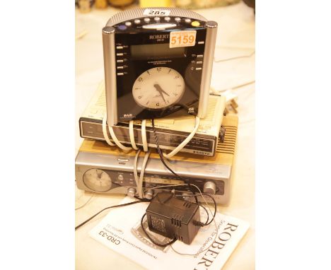 Two Roberts bedside alarm radios and a Sanyo. This lot is not available for in-house P&P.Condition Report: All electrical ite