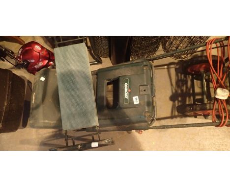 Qualcast XR30 electric lawnmower and a garden stool. This lot is not available for in-house P&P.Condition Report: All electri
