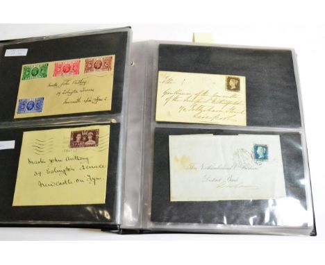 Great Britain A black cover album housing an assortment of Queen Victoria covers and entires plus pre-stamp and stampless cov