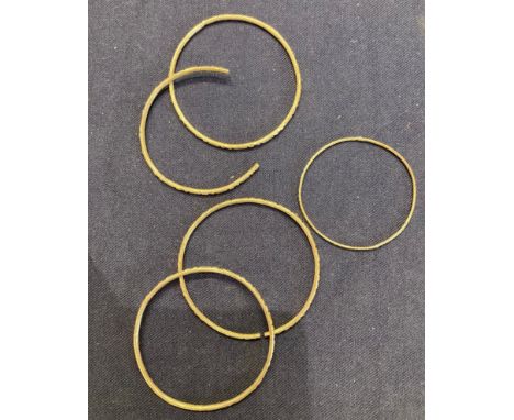 JEWELLERY Two small continental unmarked silver bangles, 11.3g  plus two similar but broken bangles 9.8g  and one small steel