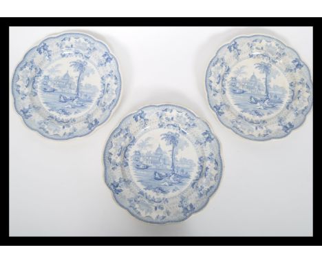 A set of three 19th century blue and white ceramic transfer printed Surseya Ghatt Khanpore plates of scalloped form by T B Go