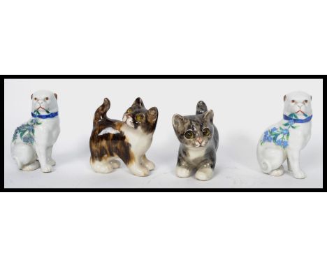 A pair of Winstanley ceramic tabby kittens - cats, each with glass eyes and signed to the base together with a pair of Georgi