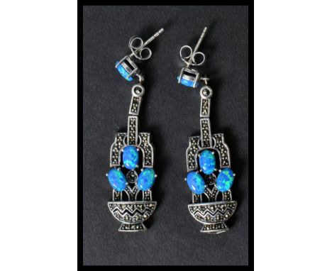 A pair of sterling silver and opal marcasite drop earrings in the Art Deco style. Weighs 9. 7 grams.