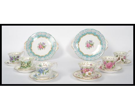 A collection of six Royal Albert Bone China cups and saucers for the months of the year together with a pair of Royal Albert 