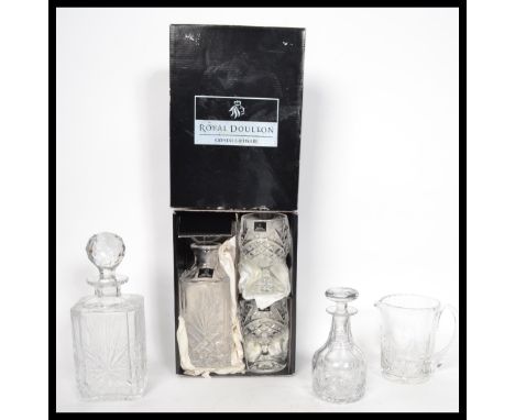 A collection of Edinburgh cut glass crystal together with a boxed Royal Doulton decanter and matching brandy glasses. Highest