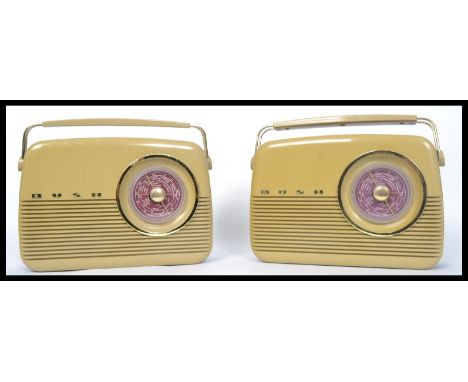 A pair of vintage mid 20th century Bush radios complete with telescopic antennae and leads. Measures 27 cm high.