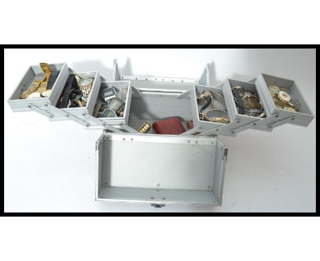 A good group of vintage watches to include digital watches, Sekonda , Rotary, Orion etc. Contained within a metamorphic box. 