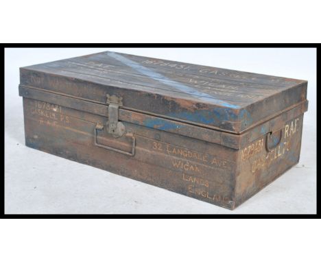 A vintage mid 20th century ebonised military metal steamer trunk. Notation to the top reading 1678431 Gaskell P.S RAF.&nbsp;M