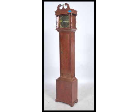 A mahogany 20th century grandmother clock marked up for Goodfellow of Wadebridge. The case with brass face having 8 day movem