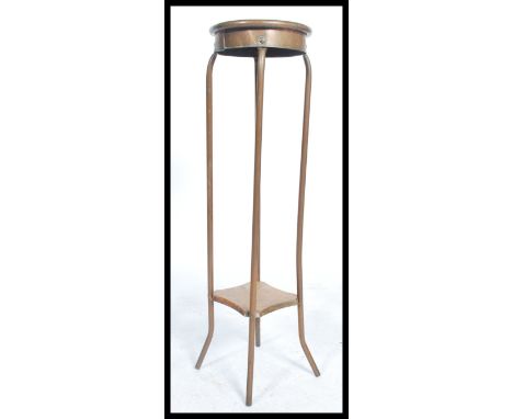 A vintage retro torchere&nbsp;plant stand comprising of shaped copper piping and plywood plinths together with a copper stick