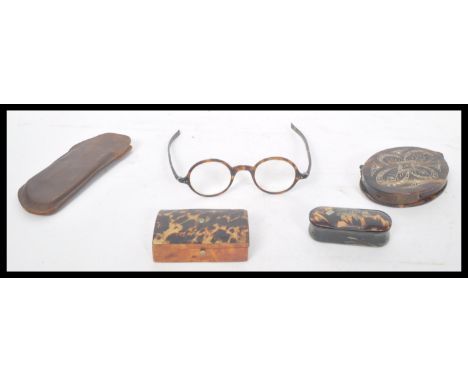 A group of tortoise shell tortoiseshell items dating from the 19th century to include a Georgian horn and tortoise shell lidd