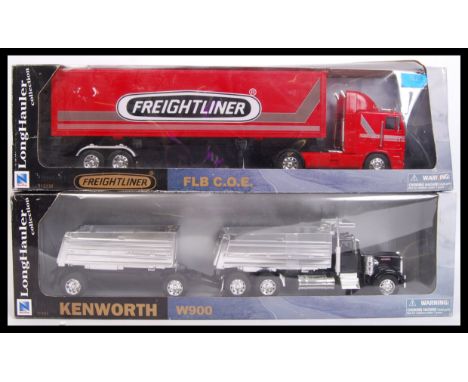 Two large scale Newray made ' Long Hauler Collection ' diecast &amp; plastic model trucks to include; 11233B FLB C.O.E &amp; 