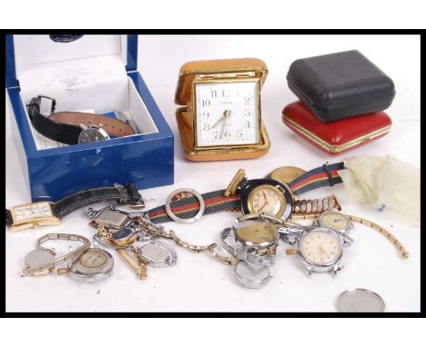 A collection of vintage 20th century watches to include a Rotary boxed watch , nurses watch , travel clocks etc. Please see i