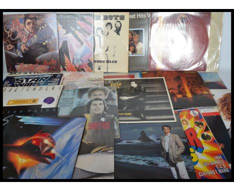 Vinyl Records - A good collection of vinyl long play LP records featuring various artists and genres to include Fleetwood Mac