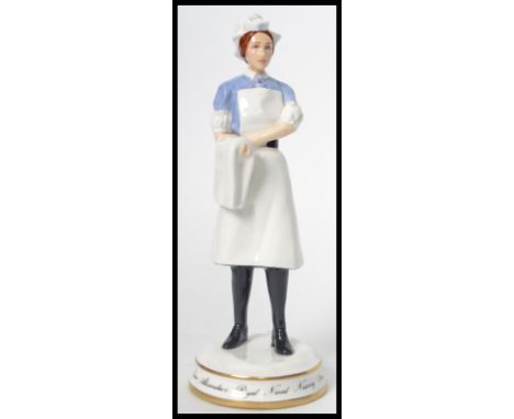 A&nbsp;Michael Sutty ceramic figurine of a nurse limited edition 53/250 model number 1986. Measures 20.5 cm high.