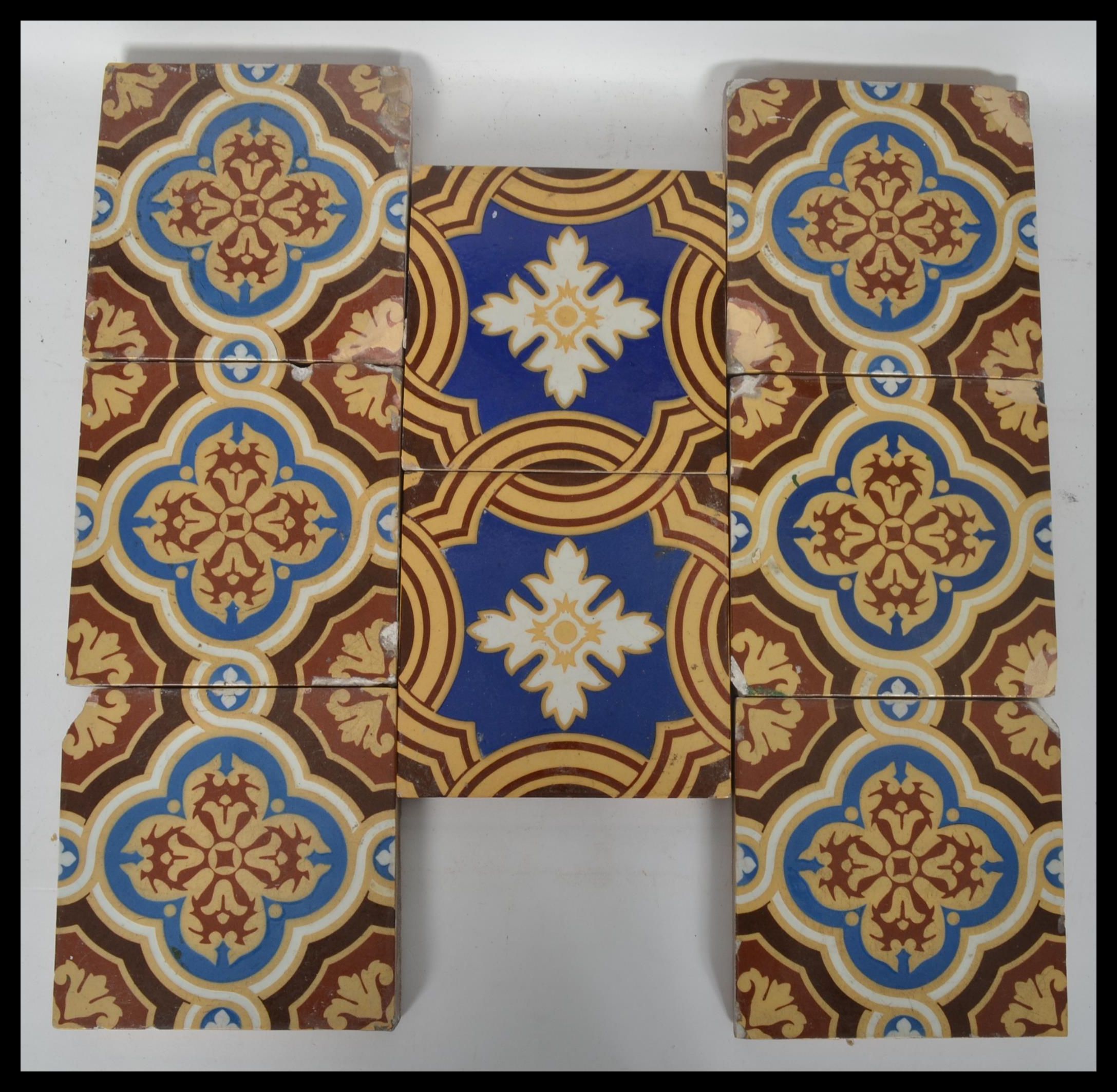 A group of eight 19th century Victorian ceramic encaustic floor tiles