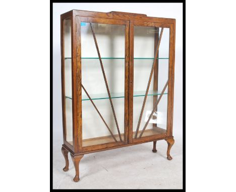 A vintage 20th century 1930's&nbsp; Art Deco china display cabinet raised on cabriole legs with sunburst astragal doors.&nbsp