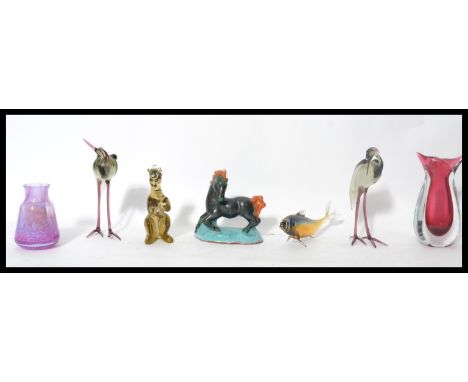A good group of studio art glass to include Caithness vase , figure of bear with crown , pair of glass storks along with a ce