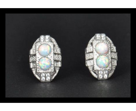 A pair of silver marcasite and opal panel earrings in the art deco style. Complete in presentation box.