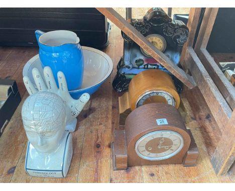 Toilet jug and basin, phrenology head and hand, and three mantel clocks.