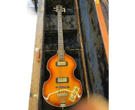 Epiphone viola bass guitar with faux skin case.
