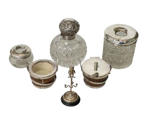 Silver mounted perfume bottle, two hair tidy's, teddy ring stand, barrel style mustard and salt.