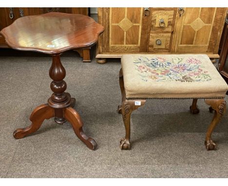 Mahogany shaped top tripod occasional table and ball and claw leg footstool with floral tapestry seat.