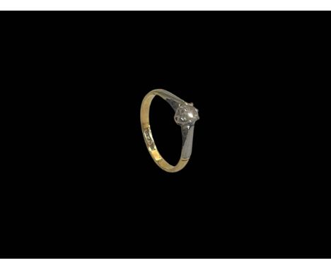 Diamond solitaire 18 carat gold and platinum set ring, size J.