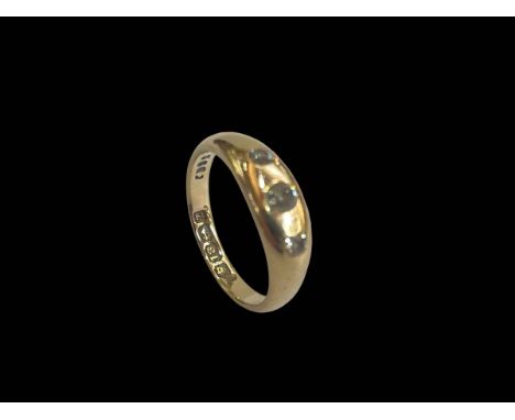 Diamond three stone 18 carat gold ring, size N.