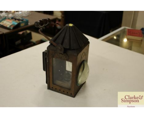 A ship's copper lamp dated 1917