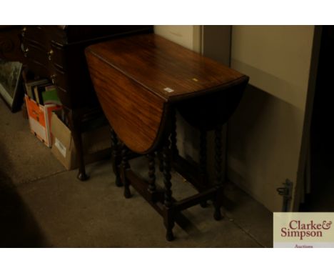 An oak gate leg barleytwist tea table 