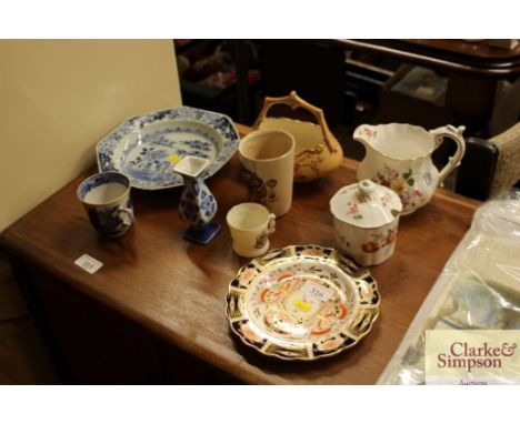 An antique Chinese octagonal plate; an English porcelain two handled mug; a Royal Worcester posy basket; and various other de