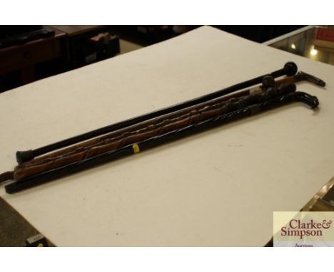 A collection of vintage walking sticks