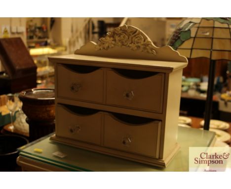 A nest of modern cream trinket drawers 