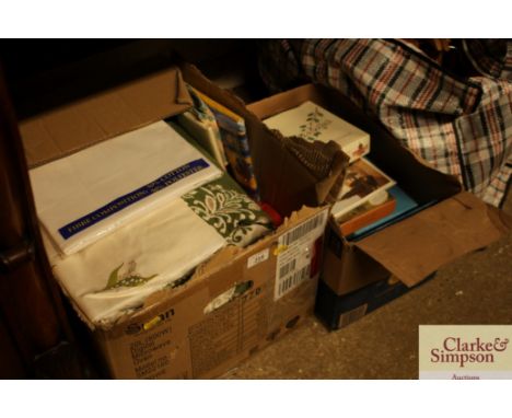 A box of various greetings cards etc and a box of miscellaneous textiles