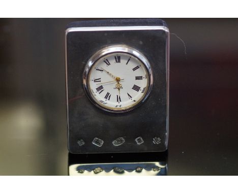 Silver faced small mantle clock Height 7 cm