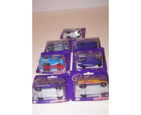 7x Model Cadbury's chocolate vans