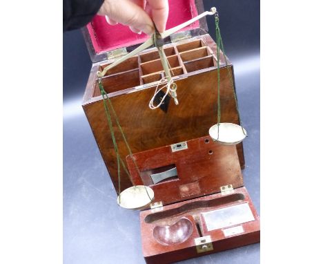 AN EARLY 19th.C.MAHOGANY APOTHECARY'S BOX WITHOUT FITTINGS TOGETHER WITH A MAHOGANY CASED PAIR OF SCALES WITH WEIGHTS. (2)