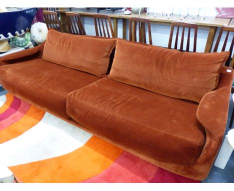 A RARE GIORGETTI DESIGN MARTINI SOFA IN BURNT ORANGE CORD UPHOLSTERY. W.254cms.