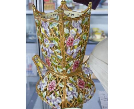 A PAIR OF ZSOLNAY PECS RETICULATED VASES, GILT SPIRES RAISED ABOVE THE SQUARE RIMS, THE TALL NECKS ABOVE HANDLES ON THE BULBO