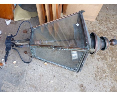 AN ANTIQUE COPPER STREET LANTERN.
