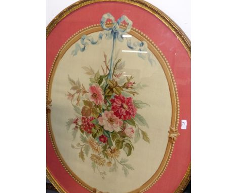 AN ANTIQUE FRENCH AUBUSSON TAPESTRY OVAL PANEL OF A GARLAND OF FLOWERS.   96 x 76cms.