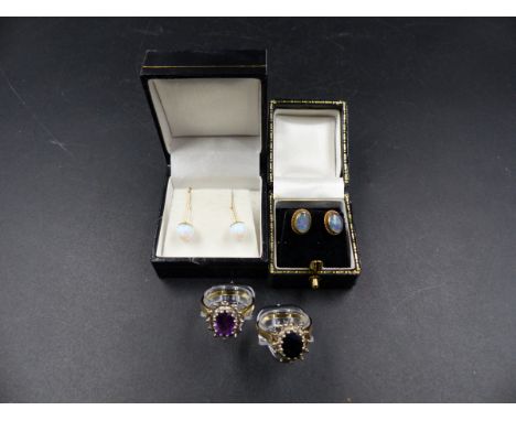 TWO 9ct GOLD GEMSET CLUSTER RINGS TOGETHER WITH TWO PAIRS OF OPAL EARRINGS.  